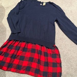 Osh Kosh dress.  Navy blue sweater attached to blue and red plaid skirt.